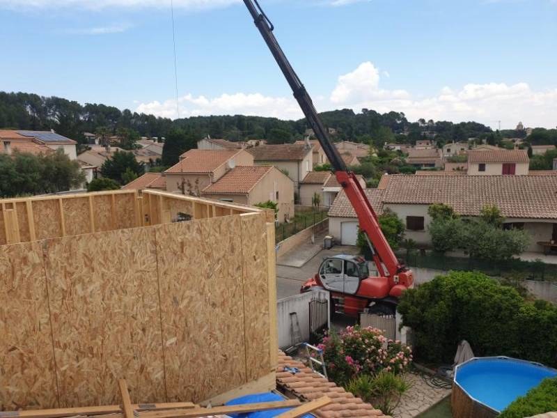 Faire réaliser un devis gratuit par des professionnel du bois pour la fabrication d'une surélévation en ossature bois sur Montpellier, Clapiers,, Sète