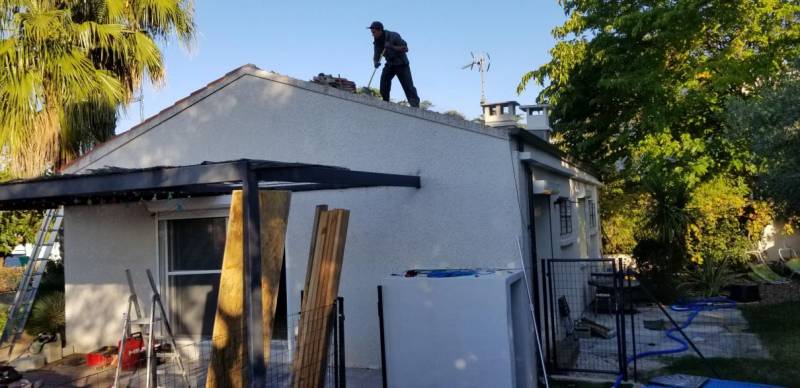 Agrandissement de maison individuelle par le toit