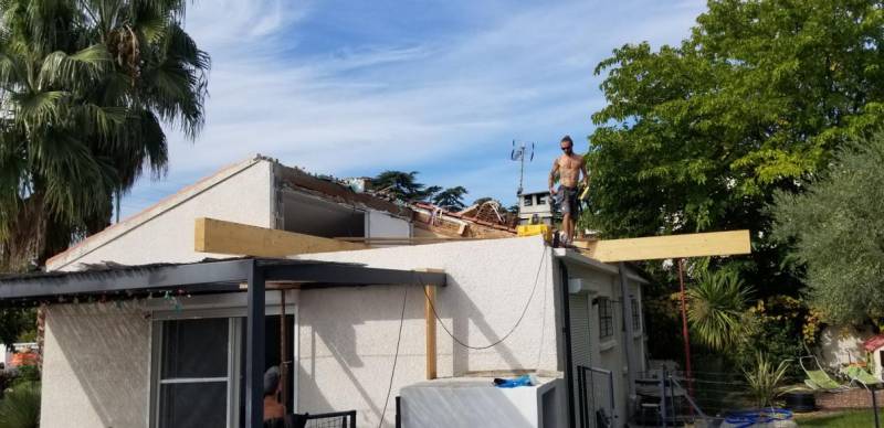 Agrandissement de maison individuelle par le toit