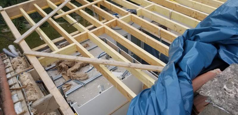 Agrandissement de maison individuelle par le toit