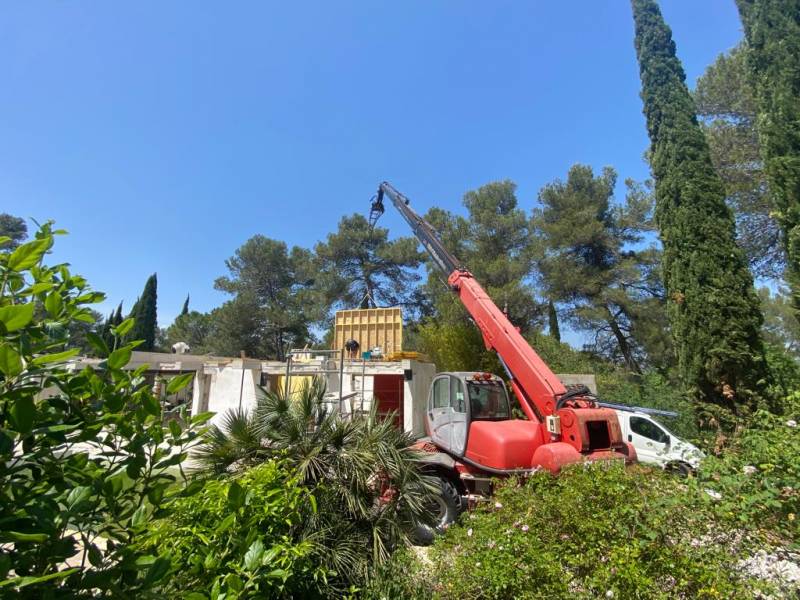 Rénovation et surélévation d'une maison en béton avec ossature bois à Montferrier