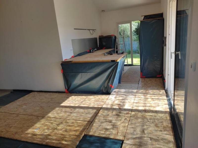 Agrandissement de maison individuelle par le toit