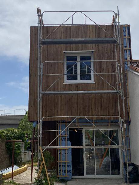 Installation d'une extension bois sur une maison au Crès