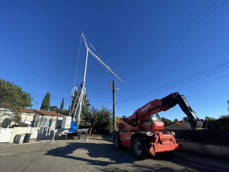 Agrandissement de maison individuelle par le toit